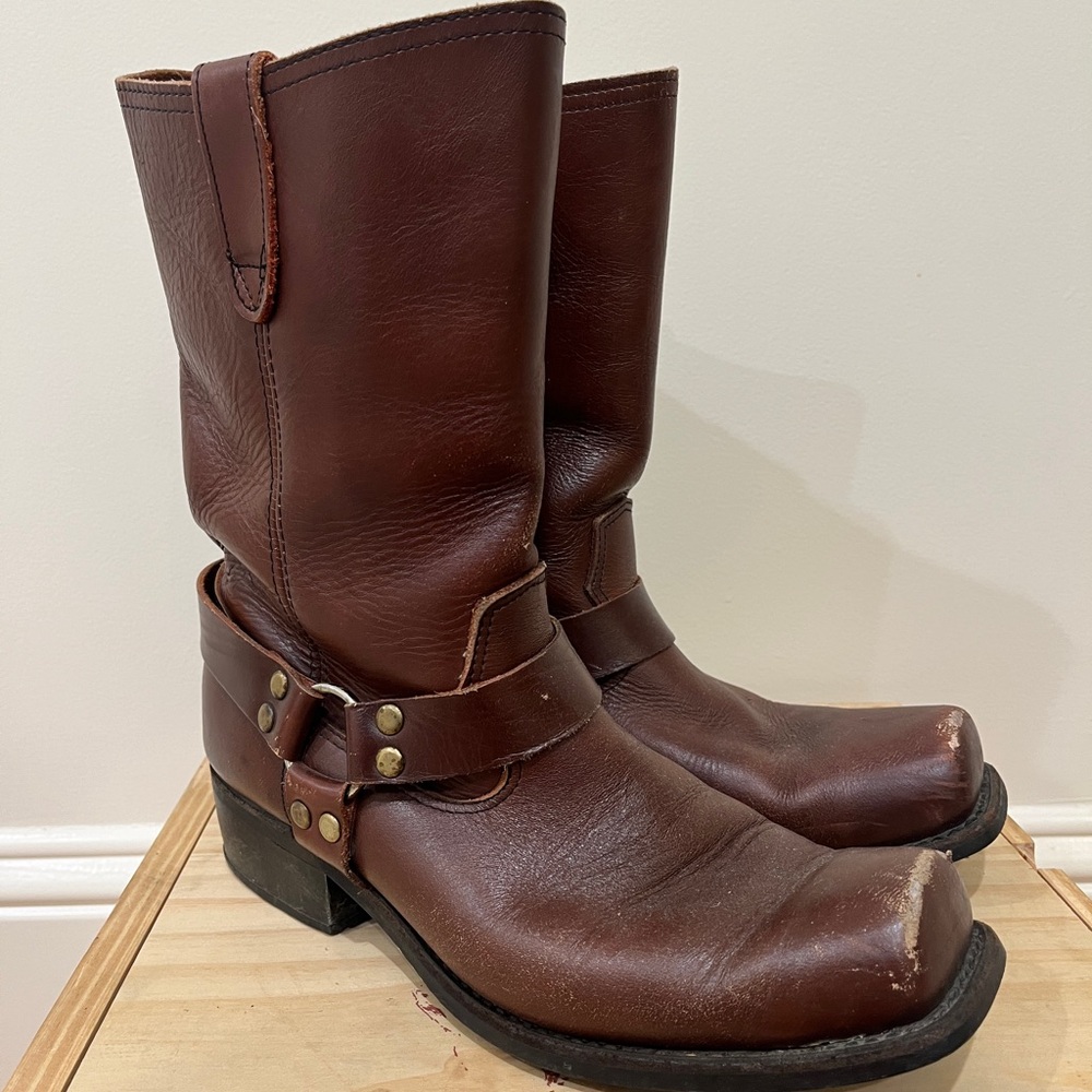 Brown leather cowboy boots with a slight heel